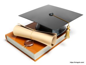 Graduation mortar on top of books HRM Gurukul GOLN 5 দাবিত্যাগ